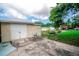 A backyard featuring a workshop, garden beds and a patio at 2060 Saffold Park Dr, Ruskin, FL 33570
