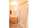 Bathroom featuring vanity with sink, mirror and glass-enclosed shower at 2060 Saffold Park Dr, Ruskin, FL 33570