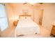 Bright bedroom features a window, ceiling fan, and tiled flooring at 2060 Saffold Park Dr, Ruskin, FL 33570