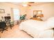 Bedroom with bed, dresser, desk, and ample workspace at 2060 Saffold Park Dr, Ruskin, FL 33570
