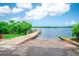 View of the boat ramp area leading into the water for easy boat launching on a bright, sunny day at 2060 Saffold Park Dr, Ruskin, FL 33570