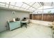 A covered patio includes a barbeque grill and seating area at 2060 Saffold Park Dr, Ruskin, FL 33570