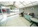Enclosed patio with translucent roof, table and chairs at 2060 Saffold Park Dr, Ruskin, FL 33570