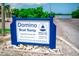 Domino Boat Ramp sign listing location, hours, and contact information for the Hillsborough County Florida ramp at 2060 Saffold Park Dr, Ruskin, FL 33570