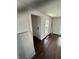 Bright bedroom with hardwood floors and an open doorway at 2321 Trelain S Dr, St Petersburg, FL 33712