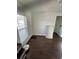Cozy, bright bedroom with hardwood floors and a window at 2321 Trelain S Dr, St Petersburg, FL 33712