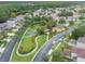 Aerial view of community park featuring playground equipment and landscaped walking paths at 27546 Stonecreek Way, Wesley Chapel, FL 33544