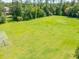 Spacious green grass soccer field ready for a game, with goals at each end at 27546 Stonecreek Way, Wesley Chapel, FL 33544