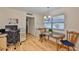 Comfortable dining area with hardwood floors, an office nook and natural light at 301 Kings Blvd # 130, Sun City Center, FL 33573