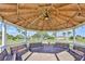 Charming gazebo with benches offers a relaxing outdoor space to enjoy the surrounding greenery at 301 Kings Blvd # 130, Sun City Center, FL 33573