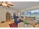 Inviting living room with hardwood floors, lots of storage, and comfortable seating at 301 Kings Blvd # 130, Sun City Center, FL 33573