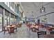 The community restaurant with tables and chairs has large windows and an ordering area at 301 Kings Blvd # 130, Sun City Center, FL 33573