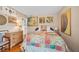 Bedroom with natural light, wood floors, and colorful decor at 3107 S Emerson St, Tampa, FL 33629