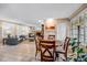 Inviting living room and dining area with tiled floors and natural light at 3107 S Emerson St, Tampa, FL 33629
