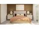 Comfortable main bedroom with soft lighting, neutral tones, and elegant furnishings at 32046 Griffin Sands Ln, San Antonio, FL 33576