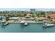 Waterfront home with boat dock, swimming pool, and stunning views of the bay and city at 333 Midway Is, Clearwater Beach, FL 33767