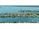 Beautiful aerial shot of waterfront properties showcasing serene canal views and charming neighborhood at 333 Midway Is, Clearwater Beach, FL 33767