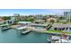 Waterfront property with pool, boat dock and sweeping city views at 333 Midway Is, Clearwater Beach, FL 33767