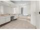 Spacious bathroom with a large soaking tub and double vanity at 333 Midway Is, Clearwater Beach, FL 33767