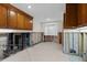Image of kitchen undergoing renovations; cabinets and a window are visible at 333 Midway Is, Clearwater Beach, FL 33767