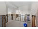 Living room undergoing renovations, with exposed framing and tiled flooring at 333 Midway Is, Clearwater Beach, FL 33767