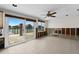 Inviting living room with sliding glass doors offering seamless indoor-outdoor living and water views at 333 Midway Is, Clearwater Beach, FL 33767
