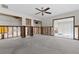A spacious room with many built-in areas for storage and a ceiling fan at 333 Midway Is, Clearwater Beach, FL 33767
