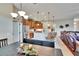 Dining area view showcasing decor with a large table and access to the kitchen at 3411 Knoxville Pl, Plant City, FL 33566