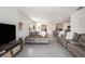 Spacious living room featuring an open floor plan and neutral color palette at 3528 Maple Grove Way, Plant City, FL 33565