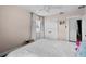 Neutral bedroom offers a closet, bright windows, and wood floors at 4002 W Watrous Ave, Tampa, FL 33629