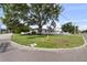 Charming single-story home with a well-manicured lawn and mature trees on a corner lot at 4002 W Watrous Ave, Tampa, FL 33629