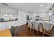 Bright kitchen with white cabinets, modern appliances, and stylish barstool seating at the island at 4002 W Watrous Ave, Tampa, FL 33629