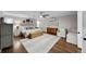 Spacious main bedroom featuring a ceiling fan, hardwood floors, and comfortable decor at 4002 W Watrous Ave, Tampa, FL 33629