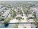 Comprehensive aerial shot of the community, highlighting the harmonious blend of residences, landscaping, and parking areas at 4014 Ashford Green Pl # G103, Tampa, FL 33613