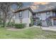 Condo exterior showing a two-story building with black iron staircases leading to the second level units at 4014 Ashford Green Pl # G103, Tampa, FL 33613