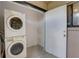 Laundry room with stacked washer and dryer at 4014 Ashford Green Pl # G103, Tampa, FL 33613