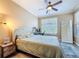 Bright bedroom with natural light, calming colors, carpet floors, and modern decor at 4221 W Spruce St # 2218, Tampa, FL 33607