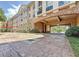 Exterior shot featuring a covered entrance, archways, and the building's architectural details at 4221 W Spruce St # 2218, Tampa, FL 33607