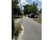 Road view showing the full length of the street with houses on either side at 467 34Th N Ave, St Petersburg, FL 33704