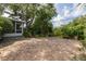 Brick paver patio provides a spacious outdoor area, surrounded by mature landscaping and a screened enclosure at 5262 25Th N Ave, St Petersburg, FL 33710
