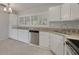 Bright kitchen features granite countertops, stainless steel appliances and tile flooring at 5262 25Th N Ave, St Petersburg, FL 33710