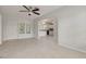 Open-concept living room featuring tile flooring, natural light, and an easy flow to the kitchen at 5262 25Th N Ave, St Petersburg, FL 33710