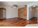 Spacious living room featuring hardwood floors, and modern accents at 5916 Tulip Flower Dr, Riverview, FL 33578