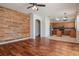 Open-concept living room with hardwood floors at 5916 Tulip Flower Dr, Riverview, FL 33578