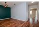 Open-concept living area featuring hardwood floors at 5916 Tulip Flower Dr, Riverview, FL 33578