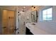 Beautiful bathroom featuring a glass shower and a vessel sink atop a modern vanity at 608 Grove N St, St Petersburg, FL 33701
