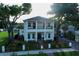Beautiful two-story home with double front porch and mature landscaping at 608 Grove N St, St Petersburg, FL 33701