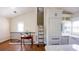 Elegant kitchen area with white cabinetry, ladder access, and natural light at 608 Grove N St, St Petersburg, FL 33701