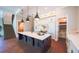 Spacious kitchen with a large island, modern appliances, pendant lighting, and butler's pantry at 608 Grove N St, St Petersburg, FL 33701