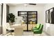 Well-appointed home office with sleek desk, stylish shelving and decor, offering a productive and inviting workspace at 6394 Journey Way, New Port Richey, FL 34655